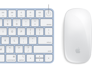 Close-up of color-matching Magic Keyboard and Magic Mouse, with Touch ID fingerprint in focus